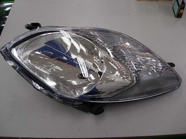 TOYOTA YARIS 2009 FARO DERECHO ELECTRICO ( INT-CROMADO ) CON MOTOR T-VAL
