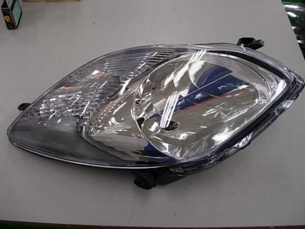 TOYOTA YARIS 2009 FARO IZQUIERDO ELECTRICO ( INT-CROMADO ) CON MOTOR T-VAL